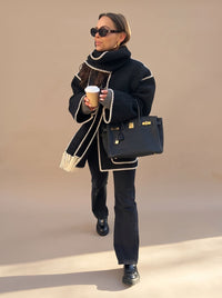 Amelia | Elegant poncho-style wool coat with crochet trim