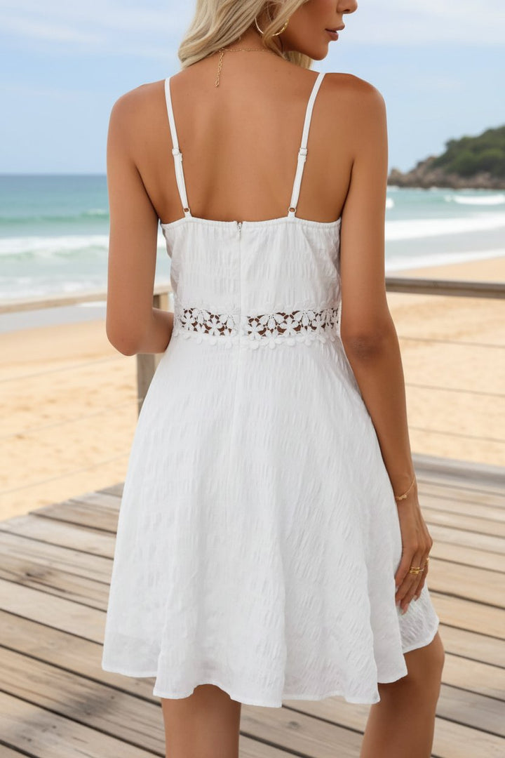 Emma | Elegantes Minikleid mit Spitzenbesatz an der Taille und Jacquard-Muster 4