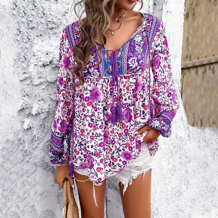 Evelyn | Leichte und luftige Tunikabluse im Boho-Stil mit Blumenmuster und Kordelzug 2