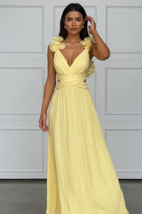 Victoria | Elegantes Und Plissiertes Maxikleid Mit Blumenapplikation